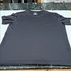Brand new TEL GEAR shirt size XL.